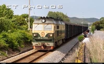 7003